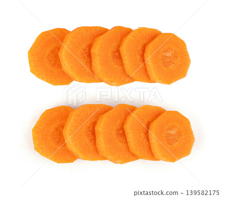 Round carrot slices isolated. Sweet orange vegetable cuts, fresh carrot circles pile 139582175