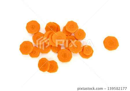 Round carrot slices isolated. Sweet orange vegetable cuts, fresh carrot circles pile Round carrot slices isolated. Sweet orange vegetable cuts, fresh carrot circles pile 139582177