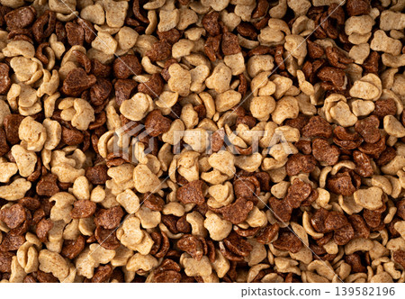 Chocolate cereal flakes texture background, rice crispy breakfast pattern Chocolate cereal flakes texture background, rice crispy breakfast pattern 139582196