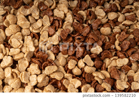 Chocolate cereal flakes texture background, rice crispy breakfast pattern 139582210