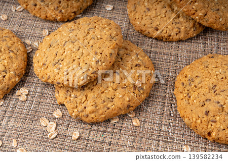 Whole and broken oatmeal cookies, cereal biscuits, fitness bakery 139582234