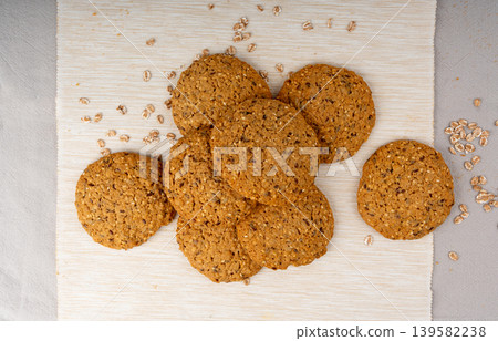 Whole and broken oatmeal cookies, cereal biscuits, fitness bakery 139582238