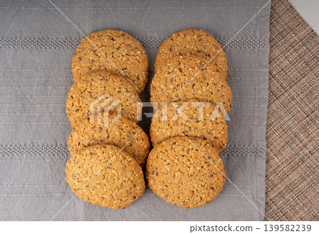 Whole and broken oatmeal cookies, cereal biscuits, fitness bakery Whole and broken oatmeal cookies, cereal biscuits, fitness bakery 139582239