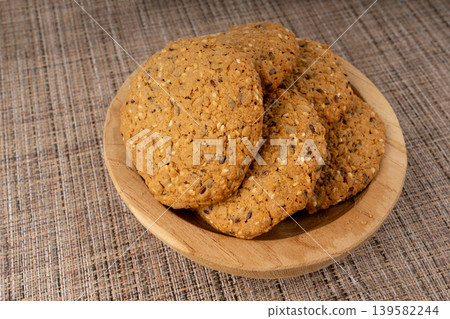 Whole and broken oatmeal cookies, cereal biscuits, fitness bakery Whole and broken oatmeal cookies, cereal biscuits, fitness bakery 139582244
