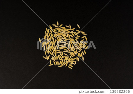 Raw orzo pasta, risoni or kritharaki pile 139582266