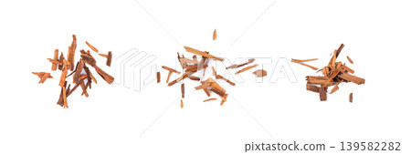 Broken ceylon cinnamon isolated, cinnamomum verum bark pieces Broken ceylon cinnamon isolated, cinnamomum verum bark pieces 139582282