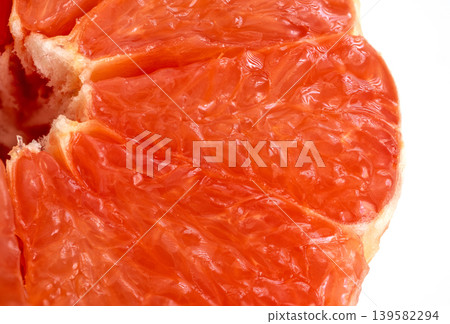 Macro texture of red grapefruit, citrus pulp closeup pattern Macro texture of red grapefruit, citrus pulp closeup pattern 139582294