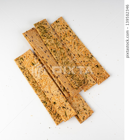 Crunchy gluten free crispbread with various seeds top view Crunchy gluten free crispbread with various seeds top view 139582346