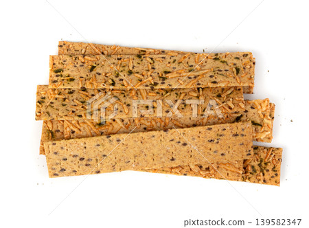 Crunchy gluten free crispbread with various seeds top view Crunchy gluten free crispbread with various seeds top view 139582347