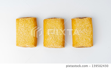 Fig roll bar, square sugar cookies with fruit filling isolated 139582430