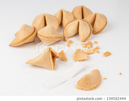 Fortune cookie isolated, lucky Chinese biscuit with prediction paper, asian surprise sweets on white background Fortune cookie isolated, lucky Chinese biscuit with prediction paper, asian surprise sweets on white background 139582444