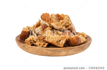 Broken wheat brown bread pieces isolated, fitness pumpkin carrot buns with seeds, cereal bread Broken wheat brown bread pieces isolated, fitness pumpkin carrot buns with seeds, cereal bread 139582543