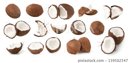 Coconut pieces, broken coco nut isolated, fresh tropical palm fruit slices, open cracked coconut 139582547