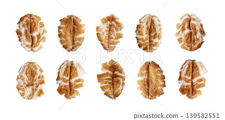 Oat flakes isolated, dry raw rolled flat spelt Oat flakes isolated, dry raw rolled flat spelt 139582551