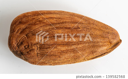 Almonds closeup isolated, nut group Almonds closeup isolated, nut group 139582568