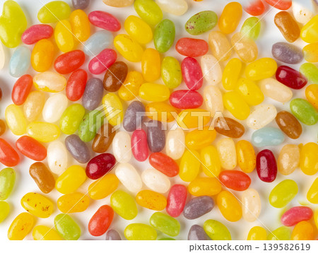 Jelly beans gummy candy pile, colorful marmalade pills Jelly beans gummy candy pile, colorful marmalade pills 139582619