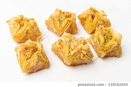 Baklava Isolated, Small Ramadan Dessert, Eastern Sweet Filo Pastries, Turkish Honey Baklawa, Oriental Desert Baklava Isolated, Small Ramadan Dessert, Eastern Sweet Filo Pastries, Turkish Honey Baklawa, Oriental Desert 139582693