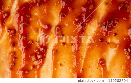 Bbq sauce pattern, barbecue ketchup stain textuted background top view Bbq sauce pattern, barbecue ketchup stain textuted background top view 139582704