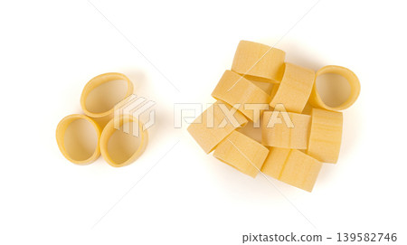 Raw Calamarata Big Pasta Isolated, Homemade Dry Macaroni, Italian Raw Round Noodle 139582746