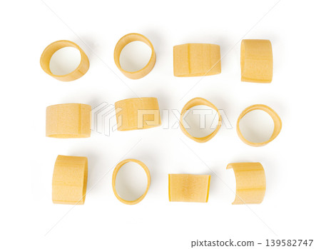Raw Calamarata Big Pasta Isolated, Homemade Dry Macaroni, Italian Raw Round Noodle Raw Calamarata Big Pasta Isolated, Homemade Dry Macaroni, Italian Raw Round Noodle 139582747