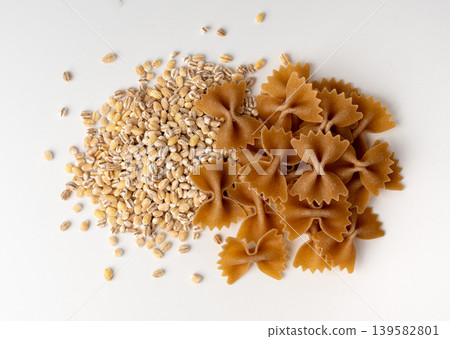 Raw Brown Farfalle Pasta Isolated Raw Brown Farfalle Pasta Isolated 139582801