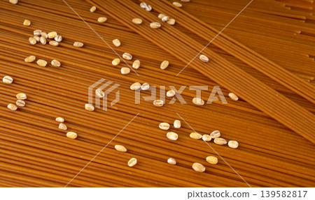Raw Brown Pasta, Wholegrain Spaghetti Raw Brown Pasta, Wholegrain Spaghetti 139582817