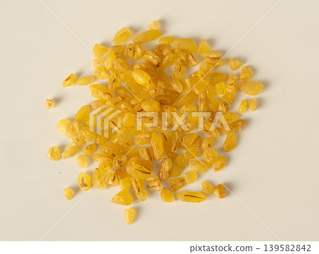 Raw bulgur closeup, dry bulghur, parboiled cracked wheat groats 139582842