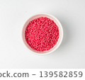 Candy sprinkle pile, round sugar sprinkles, small sweet color confectionery decoration balls Candy sprinkle pile, round sugar sprinkles, small sweet color confectionery decoration balls 139582859