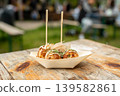 Takoyaki - traditional Japanese street food, outdoor snack with octopus Takoyaki fried balls Takoyaki - traditional Japanese street food, outdoor snack with octopus Takoyaki fried balls 139582861