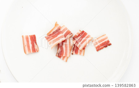 Cured carbonara pork isolated, raw smoked bacon, streaky brisket on white background Cured carbonara pork isolated, raw smoked bacon, streaky brisket on white background 139582863