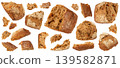 Broken wheat brown bread pieces isolated, fitness pumpkin carrot buns with seeds, cereal bread 139582871