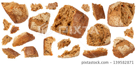 Broken wheat brown bread pieces isolated, fitness pumpkin carrot buns with seeds, cereal bread Broken wheat brown bread pieces isolated, fitness pumpkin carrot buns with seeds, cereal bread 139582871