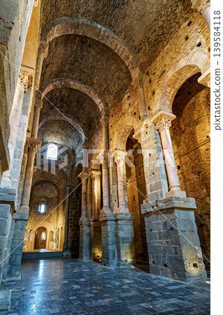 Interior of the antique monastery Sant Pedro de Rodes in the National Park of Cap de Creus, Emporda, Girona, Spain Interior of the antique monastery Sant Pedro de Rodes in the National Park of Cap de Creus, Emporda, Girona, Spain 139584118