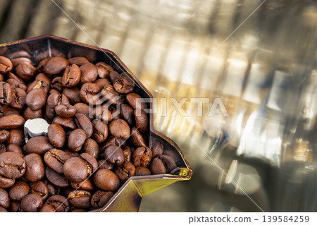 coffee beans in coffee machine 139584259