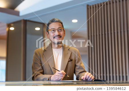Senior man traveling. Photo courtesy of Ito Ryokuyo. Senior man traveling. Photo courtesy of Ito Ryokuyo. 139584612
