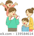 A family of four with a cheerful atmosphere. 139584614
