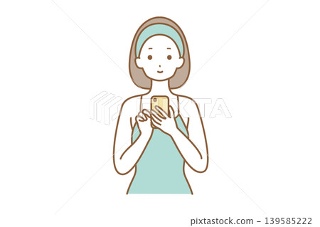 A woman operating a smartphone A woman operating a smartphone 139585222
