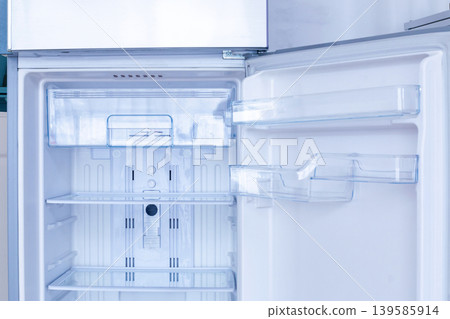 Empty Clean Refrigerator Interior with Plastic Shelves and Drawers Empty Clean Refrigerator Interior with Plastic Shelves and Drawers 139585914
