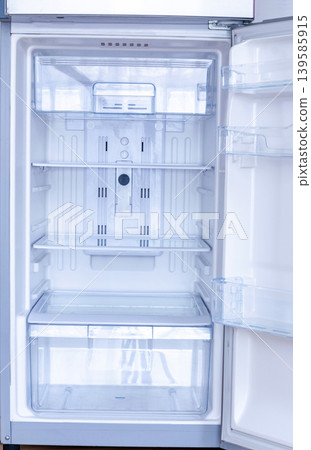 new modern refrigerator opens to reveal the inside, empty refrigerator new modern refrigerator opens to reveal the inside, empty refrigerator 139585915