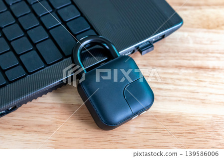 Digital Cyber Security Concept with Black Padlock and Laptop 139586006