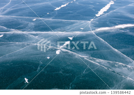 Aerial winter view of cracked ice patterns on Lake Baikal, Siberia, Russia Aerial winter view of cracked ice patterns on Lake Baikal, Siberia, Russia 139586442