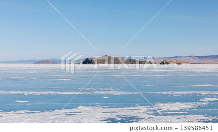 Frozen Lake Baikal landscape with drifting ice floes, Maloye More strait 139586451