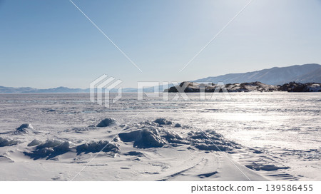 Frozen Lake Baikal landscape in Maloye More strait with ice hummocks Frozen Lake Baikal landscape in Maloye More strait with ice hummocks 139586455