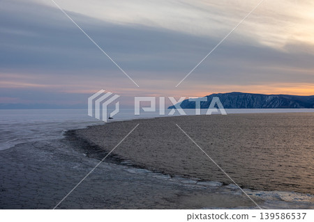 Winter sunset at the Angara River and Lake Baikal confluence, Listvyanka Winter sunset at the Angara River and Lake Baikal confluence, Listvyanka 139586537