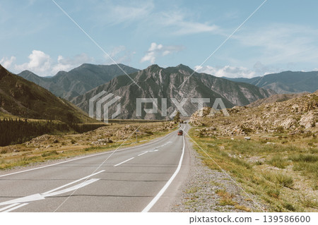 Scenic Chuysky Trakt highway through Altai Mountains with open road view Scenic Chuysky Trakt highway through Altai Mountains with open road view 139586600