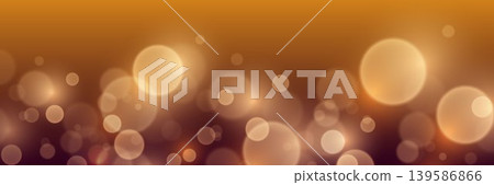 Warm golden brown bokeh blurred background creating festive abstract light effect 139586866