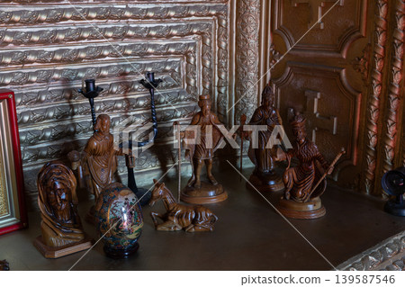 Ruh Ordo cultural complex interior with carved wooden figurines and decor Ruh Ordo cultural complex interior with carved wooden figurines and decor 139587546