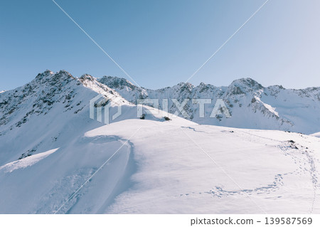 Winter panorama of snowy Tien Shan mountains near Karakol ski base, Kyrgyzstan Winter panorama of snowy Tien Shan mountains near Karakol ski base, Kyrgyzstan 139587569