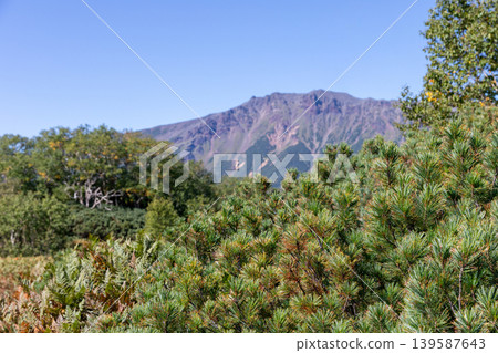 Uzon Volcano caldera landscape with mountain ridge and tundra, Kamchatka Uzon Volcano caldera landscape with mountain ridge and tundra, Kamchatka 139587643