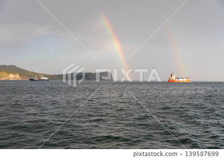 Cargo ships under double rainbow in Avacha Bay near Petropavlovsk-Kamchatsky Cargo ships under double rainbow in Avacha Bay near Petropavlovsk-Kamchatsky 139587699
